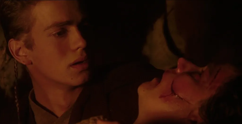 Anakin Skywalker holds his dying mother, Shmi Skywalker, in Attack of the Clones.