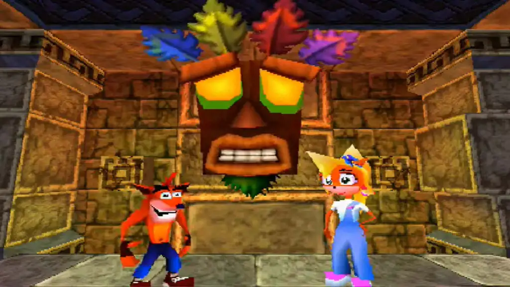Crash and Coco standing on either side of Aku Aku