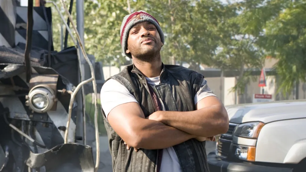 Hancock with arms crossed