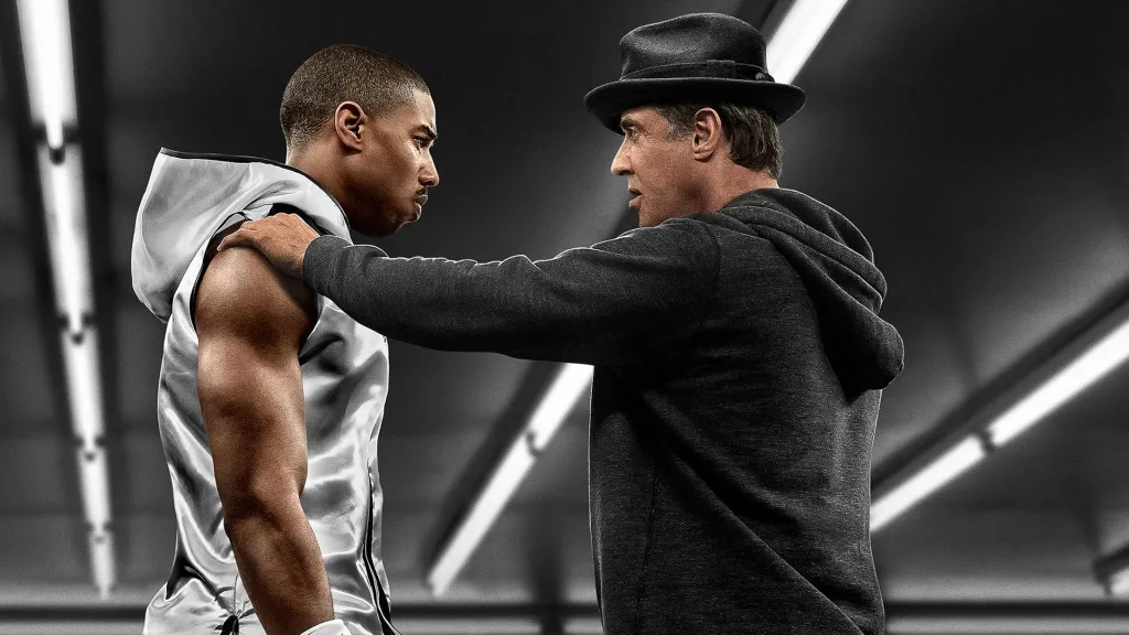 Michael B Jordan as Adonis Johnson and Sylvester Stallone as Rocky Balboa in Creed