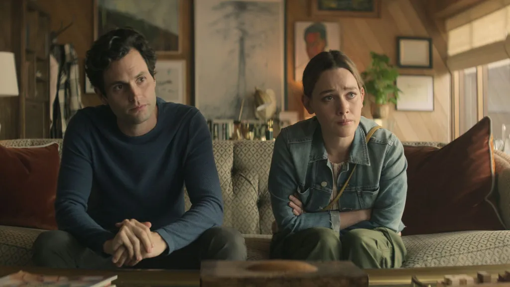 Penn Badgley as Joe Goldberg and Victoria Pedretti as Love in Season 3 of You