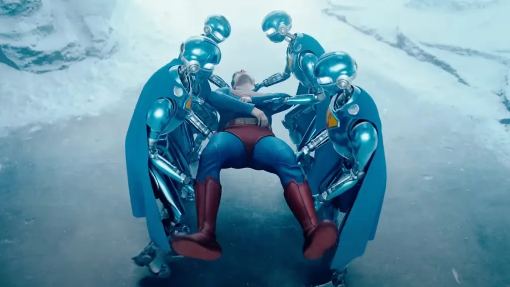 Superman doing a trustfall with his robocompanions.