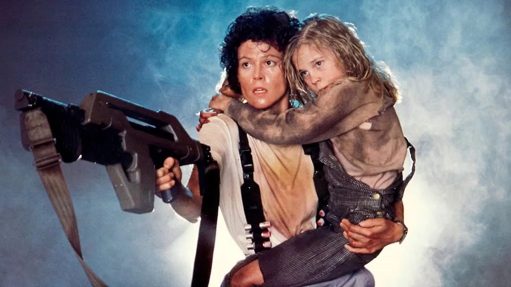 Ripley holding Newt
