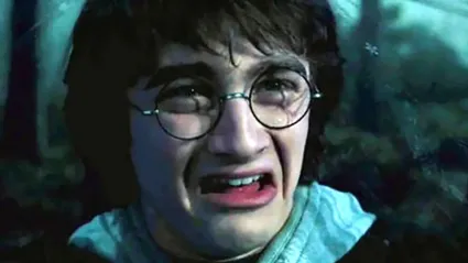 Daniel Radcliffe as Harry Potter grimacing