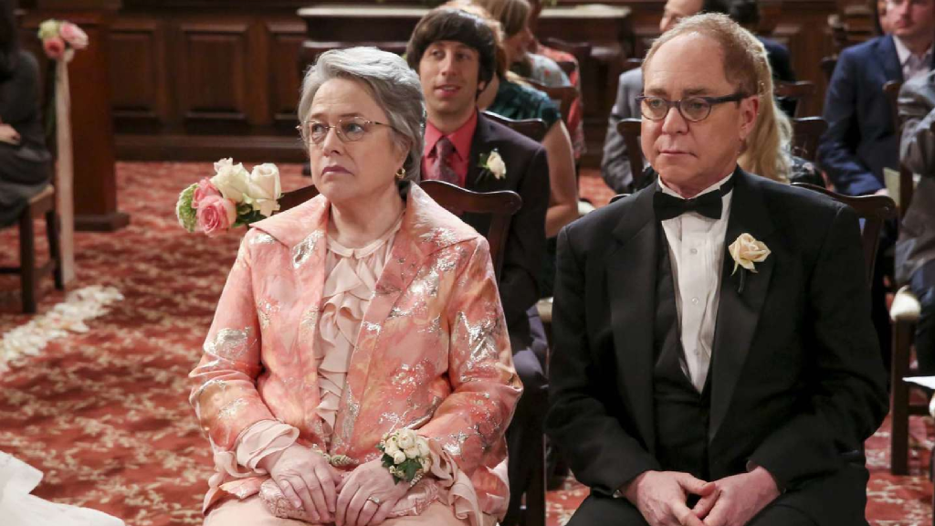 Mrs and Mr Fowler at Sheldon and Amy's wedding in The Big Bang Theory
