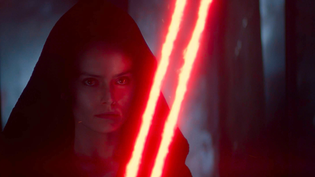 Dark Rey (Daisy Ridley) with double-bladed lightsaber in Star Wars The Rise of Skywalker