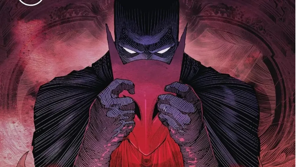 Batman holding a red mask in front of his face