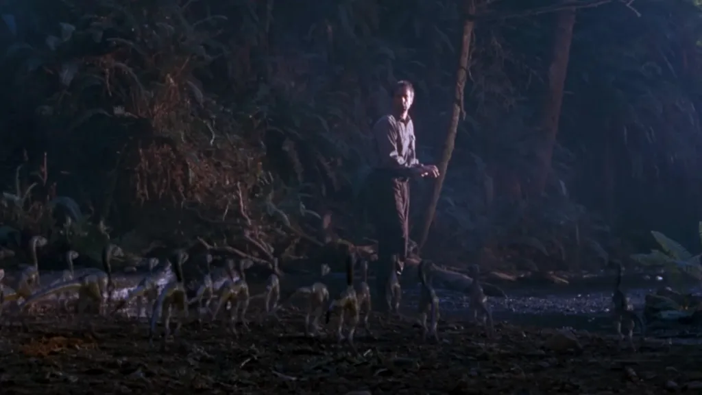 Peter Stormare and a swarm of Compys in The Lost World: Jurassic World