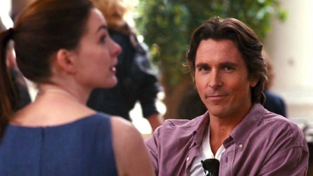 Bruce Wayne smiling at the end of The Dark Knight Rises (2012)