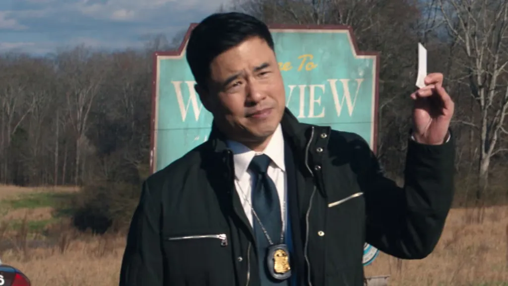 Jimmy Woo showing a card in WandaVision.