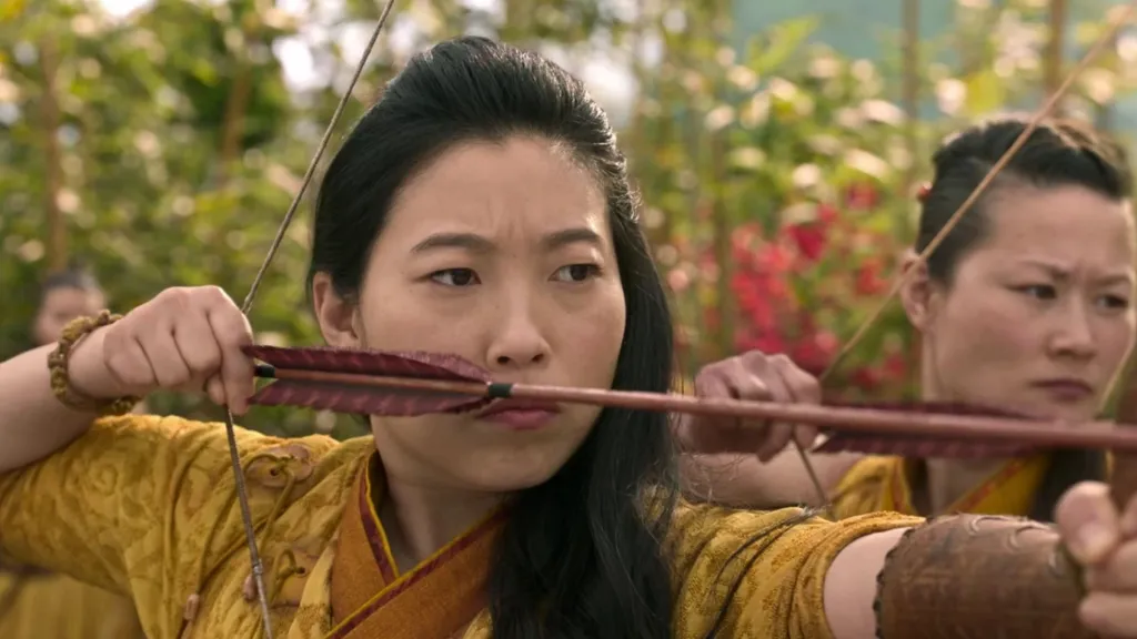 Katy using a bow in Shang-Chi.