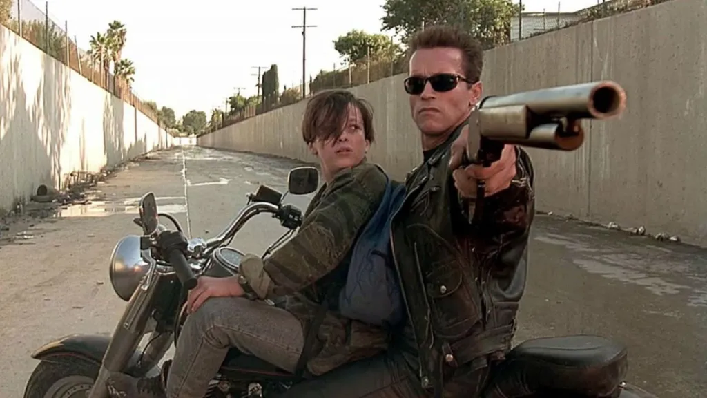 Arnold Schwarzenegger as T-800 and Edward Furlong as John Connor in Terminator 2 Judgment Day
