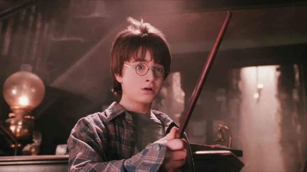 Harry with wand in Harry Potter and the Sorcerer's Stone
