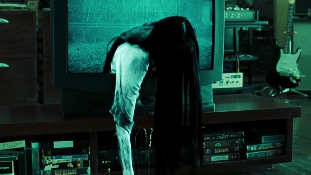 Ghost girl crawling through TV screen in The Ring