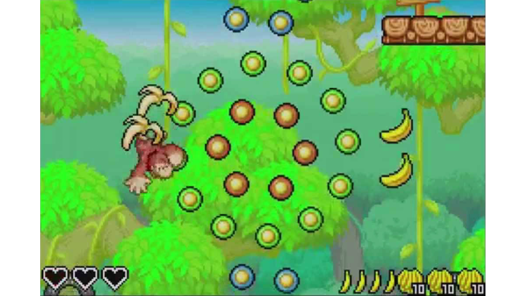 A screenshot from DK: King of Swing, showing DK jumping and gathering bananas.