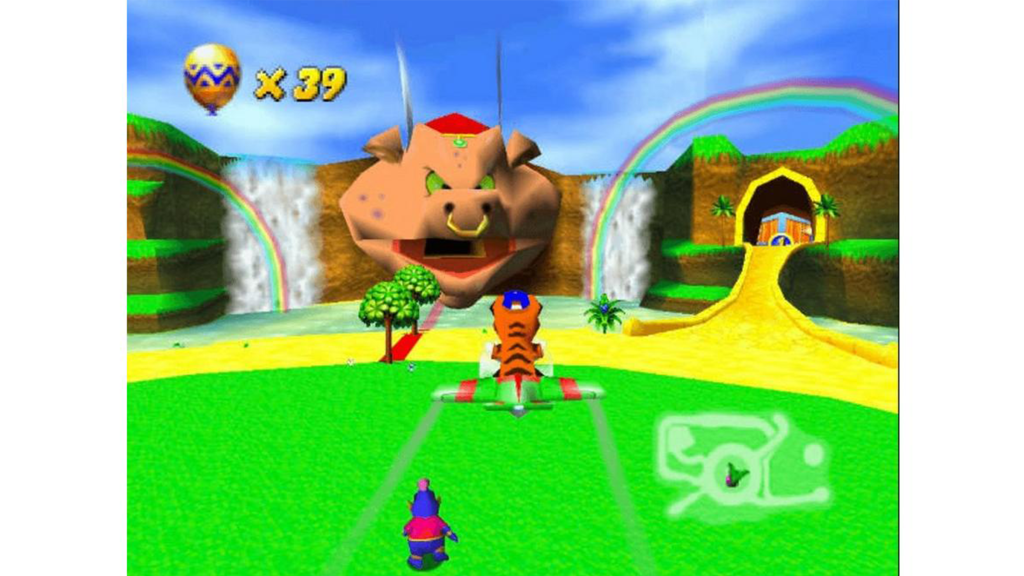 A screenshot from Diddy Kong Racing, showing a player making their way down a track.
