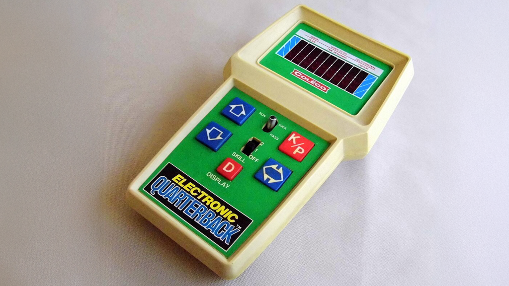 A picture of the handheld game Electronic Quarterback on a white background.