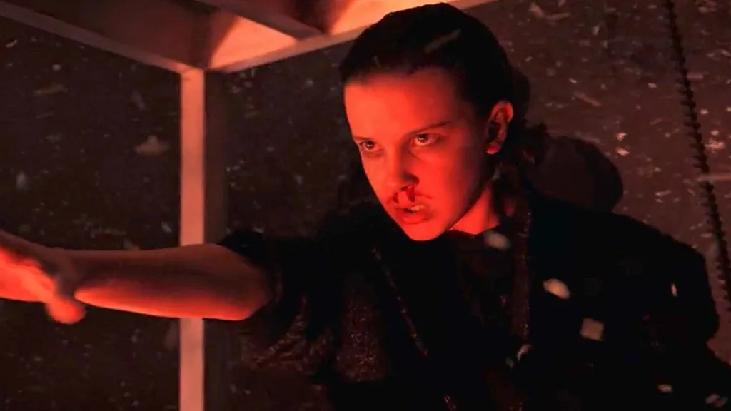 Millie Bobby Brown as Eleven closing the gate in Stranger Things Season 2