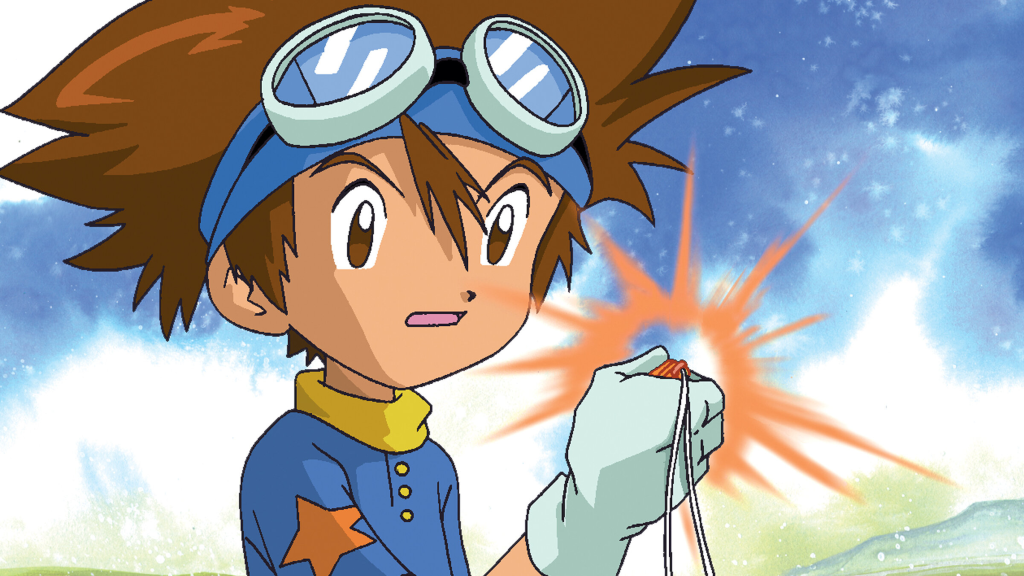 Tai holding a crest and looking shocked in Digimon Adventure
