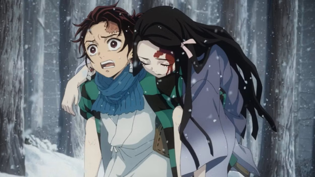 Tanjiro carrying Nezuko through the snow in Demon Slayer