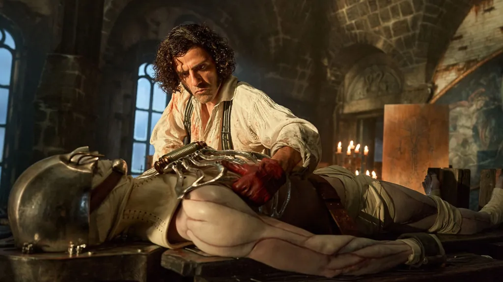 Oscar Isaac as Dr Frankenstein bringing his monster to life in Frankenstein (2025)