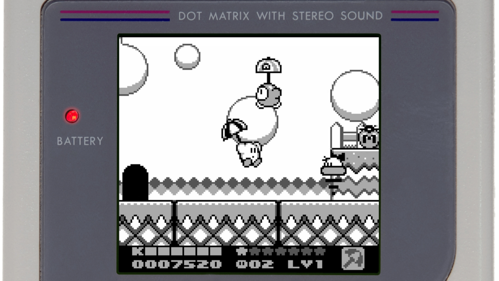 A screenshot from Kirby’s Dream Land 2, showing Kirby floating from an umbrella.
