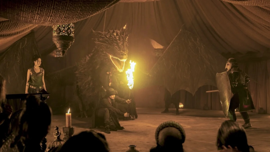 A dragon puppet in the puppet show in A Knight of the Seven Kingdoms Episode 1
