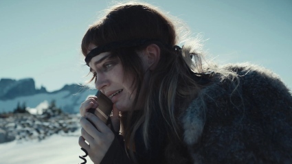 Sophie Thatcher as Natalie calling for help in the snow in Yellowjackets Season 3