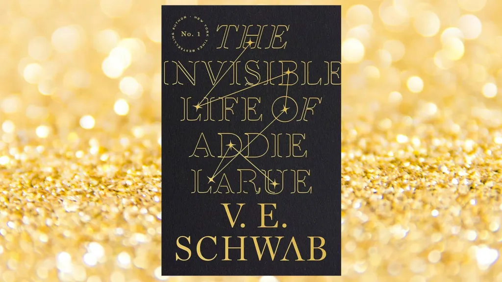 The cover of The Invisible Life of Addie LaRue against a gold background