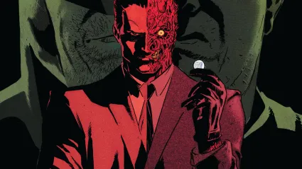 Two Face holding coin