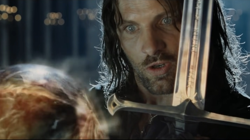 Aragorn showing his sword to Sauron through the Palantir in The Return of the King