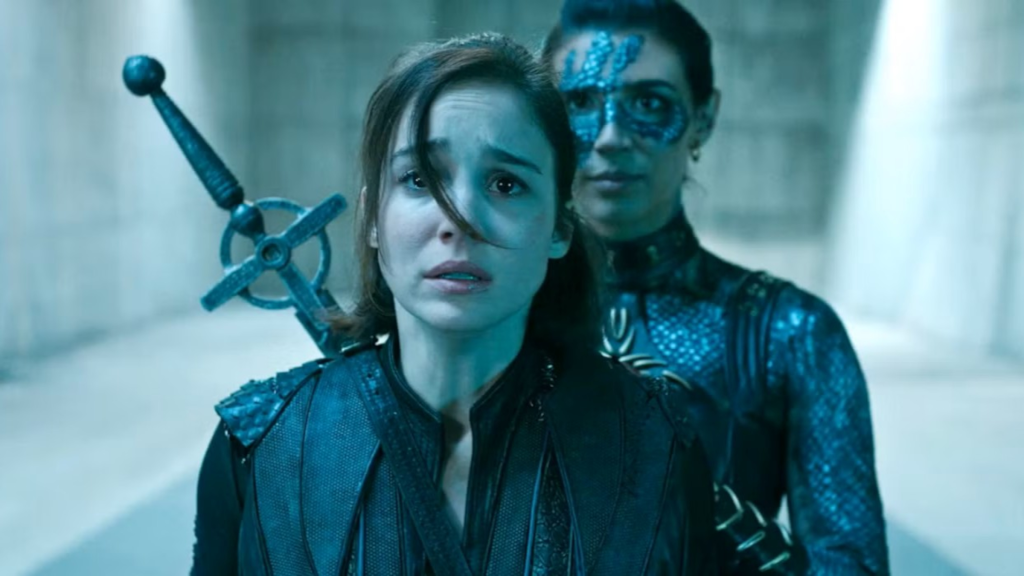 Ava looking scared in Warrior Nun with Lilith behind her