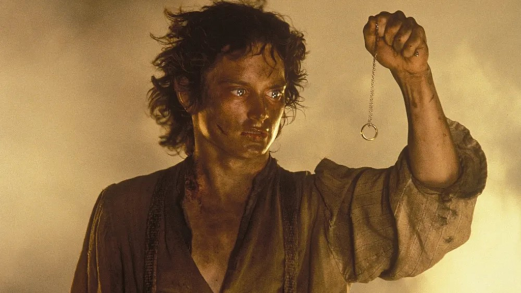 Frodo holding up the One Ring at Mount Doom in The Lord of the Rings: The Return of the King