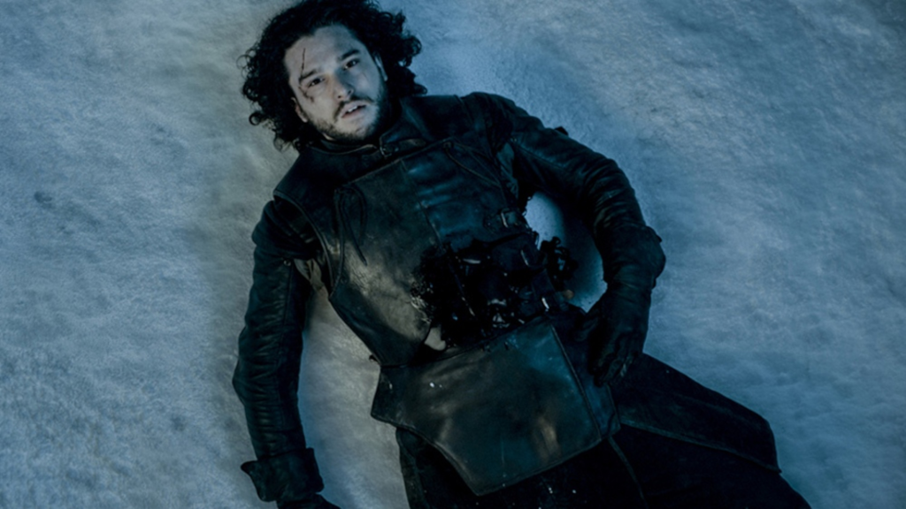 Jon Snow dying in the snow in Game of Thrones