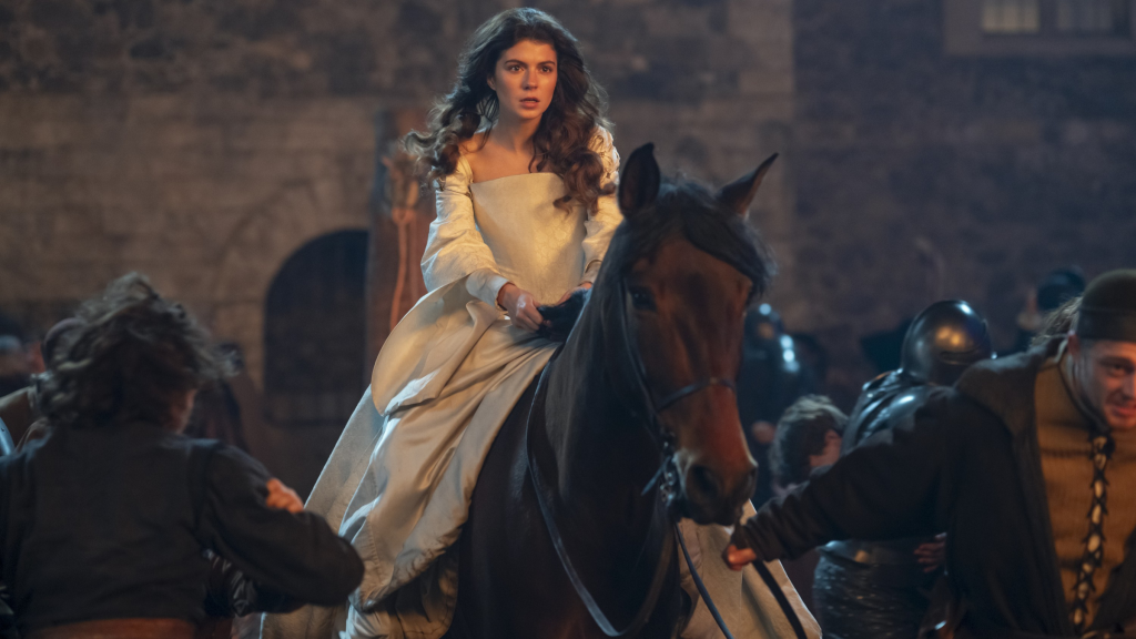 Jane riding a horse in a white dress at the end of My Lady Jane