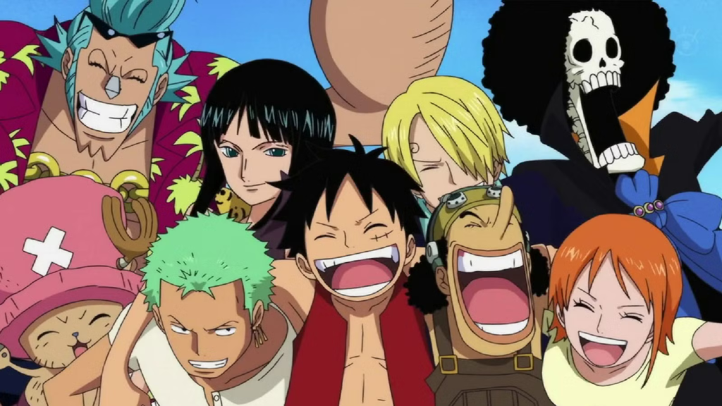 Luffy and the members of the Straw Hats smiling in One Piece