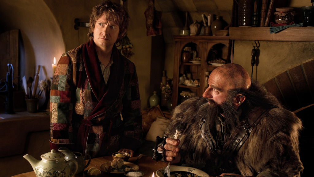 Bilbo annoyed at the Dwarves eating in his house in The Hobbit: An Unexpected Journey