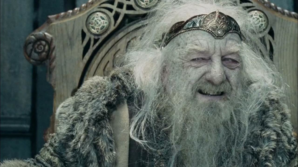 Theoden laughing at Gandalf from his throne in The Lord of the Rings: The Two Towers