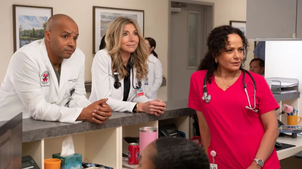 Donald Faison as Turk, Sarah Chalke as Elliot, and Judy Reyes as Carla Espinosa in the Scrubs revival