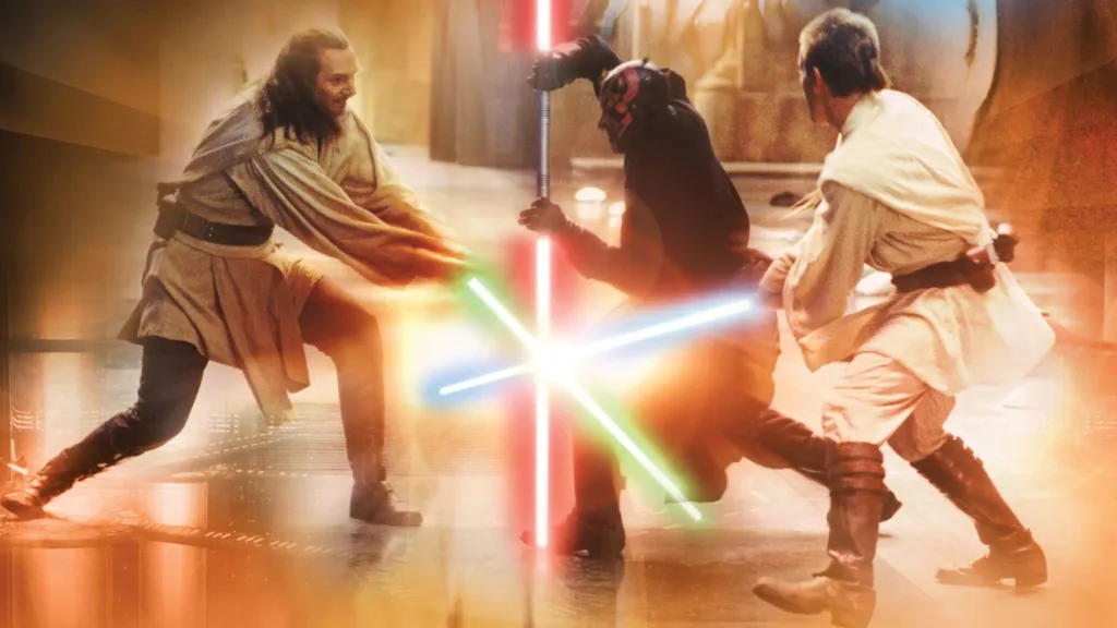 Liam Neeson as Qui-Gon Jinn and Ewan McGregor as Obi-Wan Kenobi fighting Ray Park as Darth Maul in Star Wars Episode 1 The Phantom Menace