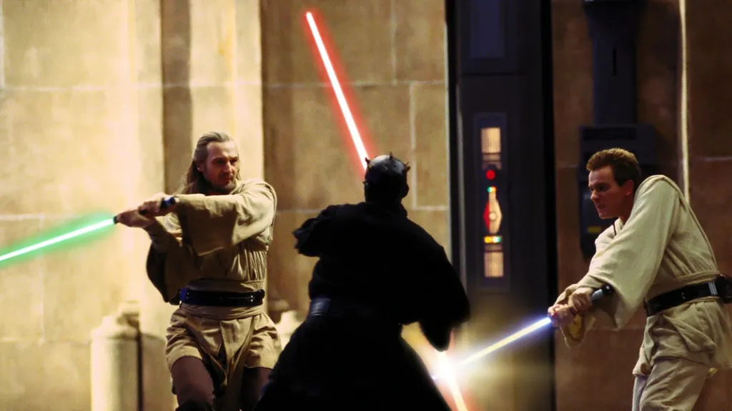 Liam Neeson as Qui-Gon Jinn and Ewan McGregor as Obi-Wan Kenobi fighting Ray Park as Darth Maul in Star Wars The Phantom Menace