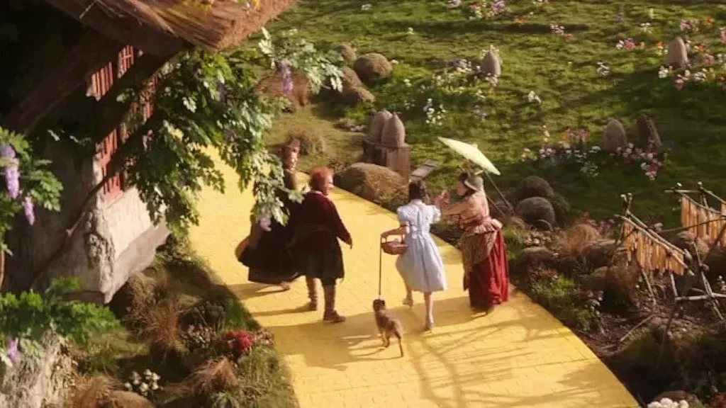 Dorothy and her companions on the Yellow Brick Road in Wicked: For Good